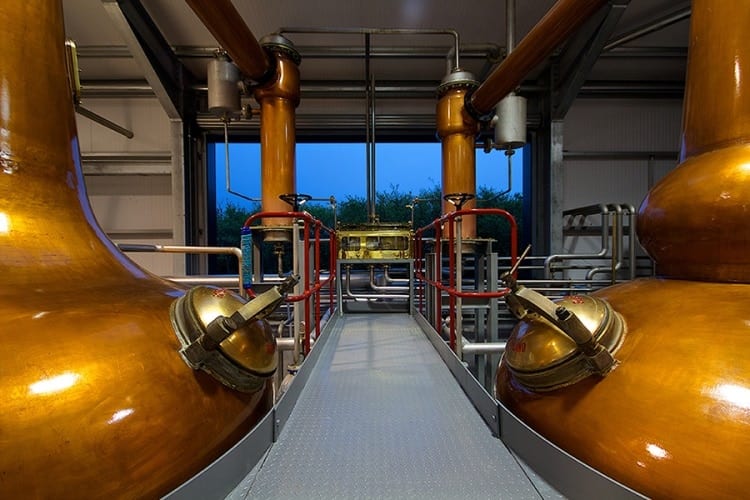 The stills at the Wolfburn distillery in the Highlands of Scotland